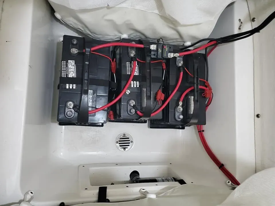 Battery charger installed in a boat hatch