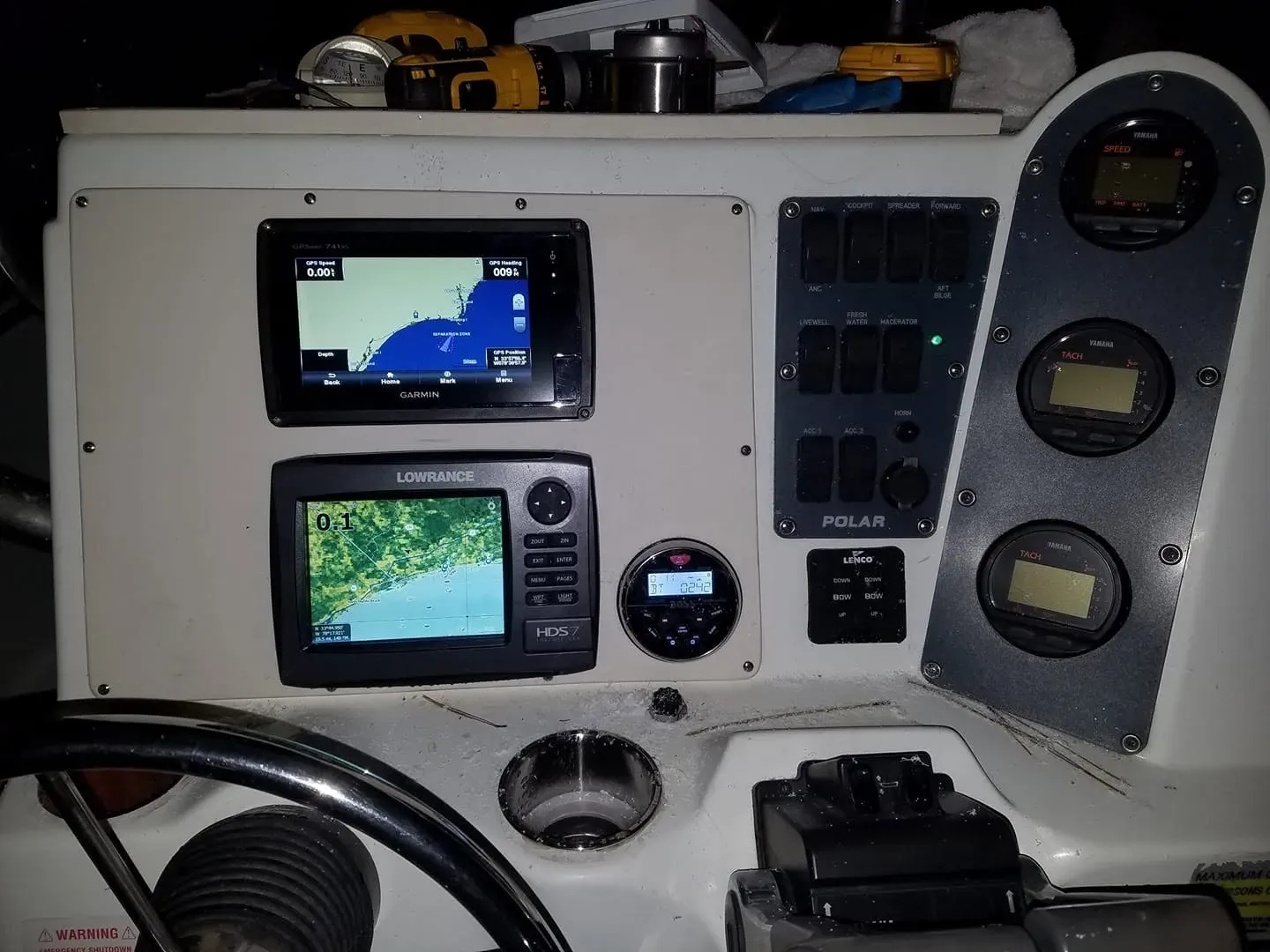 Boat helm with engine gauges and displays