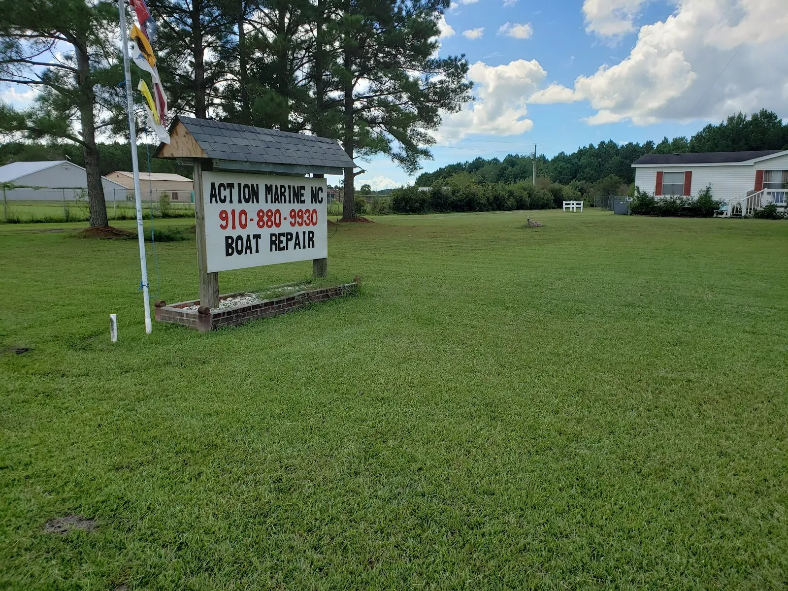 Action Marine NC boat repair sign on Longwood Road